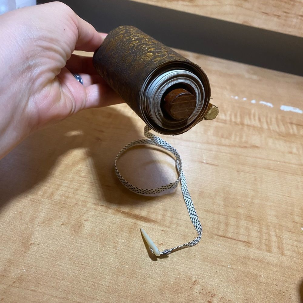 Elegant Brown Scroll With Intricate Design - image 3